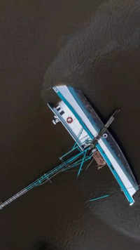 Fuel leaks from a capsized boat along Bayou Lafourche in <i class="tbold">galliano</i>, Louisiana.