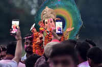 Ganeshotsav 2021: Devotees immerse idols of <i class="tbold">lord ganesha</i> in water