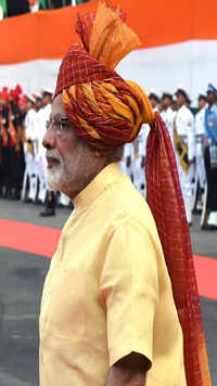 For India's 71st I-Day, PM Modi's turban was a mix of bright red and yellow with woven gold embroidery.