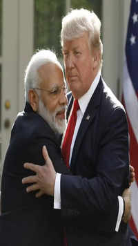 2017: PM Modi hugs President Donald Trump as they give joint statements in the Rose Garden of the White House.