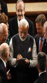 2016: Modi signs autographs after addressing a joint meeting of Congress in the House Chamber on <i class="tbold">capitol hill</i>.
