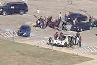 Another video grab of law enforcement officers arriving at the Timberview High School in Dallas area.