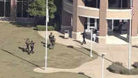 A video grab of students evacuating Timberview High School in Arlington, Texas, on Wednesday.