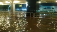 Photos: <i class="tbold">bengaluru airport</i> flooded, flyers use tractors