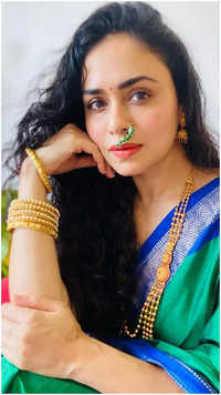 ​Birthday girl Amruta Khanvilkar shows how to style a sari​