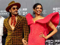 ​Ranveer Singh and Deepika Padukone prove they're the King and Queen of fashion at <i class="tbold">red sea</i> Film Festival