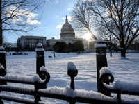 ​The <i class="tbold">capitol hill</i> after a snowfall in the Washington, DC, region, on January 7.