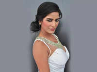 Poonam Pandey wears transparent saree with a deep neck blouse