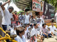 Congress workers protest outside the <i class="tbold">aicc</i> office against summoning of party leader Rahul Gandhi by the ED, in New Delhi.