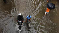 Rain menace in Mumbai: Pics of waterlogged roads, flooded colonies