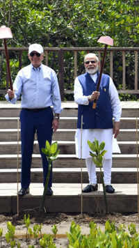 PM Modi with US president at the Mangrove Forest.