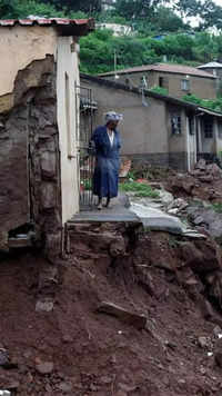 After heavy rains caused <i class="tbold">flood damage</i> at KwaNdengezi in South Africa's Durban in April