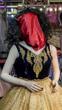 Hooded <i class="tbold">mannequins</i>