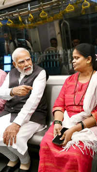 PM Modi takes Metro ride with <i class="tbold">mumbaikars</i>