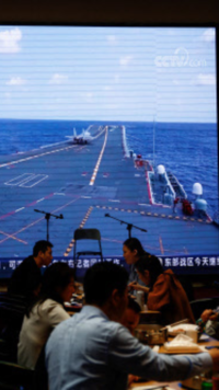 US warship sailed near manmade Chinese-controlled isle in South China Sea