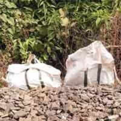 Body chopped and kept in gunny bags, found near tracks