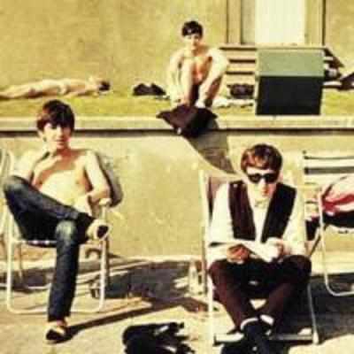 Unseen Beatles: '63 pics show Fab Four having fun in the sun