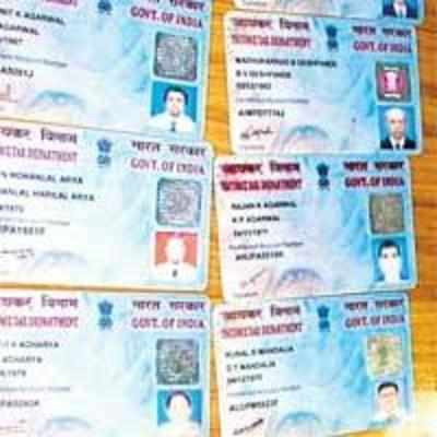 Govt to launch biometric PAN cards: FM