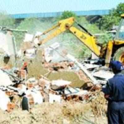 Cidco demolishes under-construction building  in Panvel, removes illegal structures