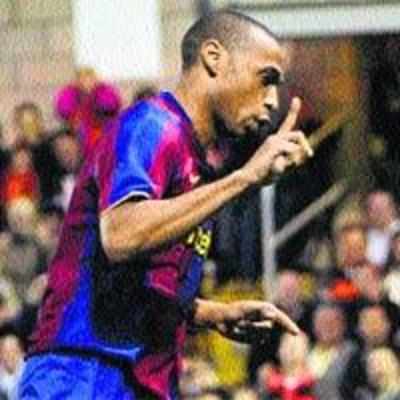 Henry scores on Barcelona debut