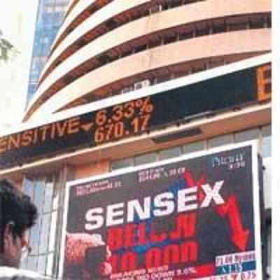 Sensex tumbles to four-digit figures