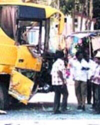 Truck driver rams school bus, dies