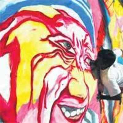 Brush-in-mouth artist eyes Guinness record