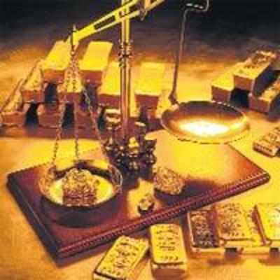 Gold shines to Rs 13,000 per tola as Sensex sinks