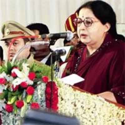 Left, Right cheer as Amma takes oath