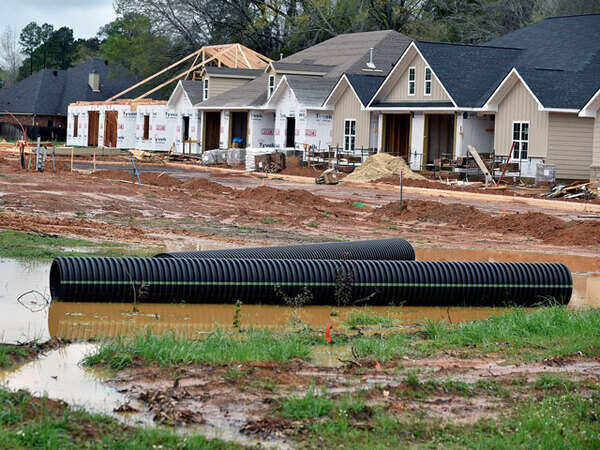 Will compensate buyers if property value falls, assure builders