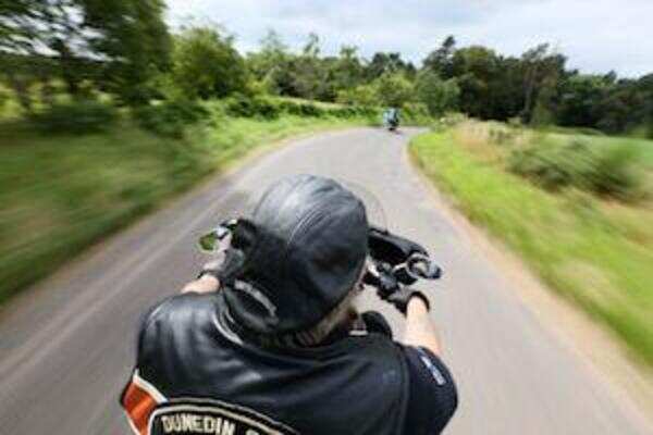Biker seriously injured as hoarding falls on him