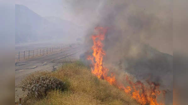 In Pics: California Wildfires Prompt Evacuations Amid Heat Wave