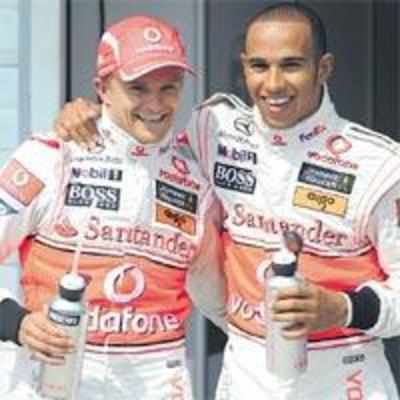 Hamilton leads a McLaren one-two