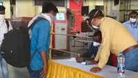 Migrant workers arrive at Charbagh railway station from Gujarat, undergo thermal screening 
