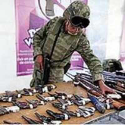 Mexico City's exchange offer: Cash and computers for guns