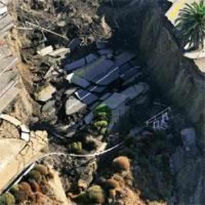 Section of california roadway slides into the ocean