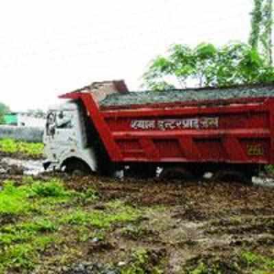 Yet another truck sinks on bad road