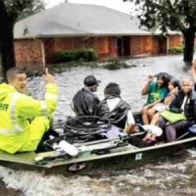 Isaac steers clear of direct blow to New Orleans, loses steam