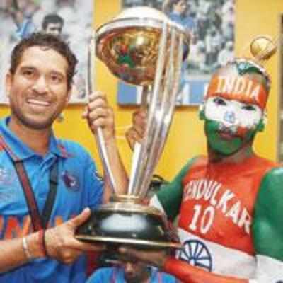 Sachin's biggest fan's moment with the Cup
