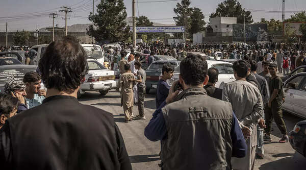 As US troops searched Afghans, a bomber in the crowd moved in