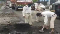 Mumbai: Cops fill potholes on national highway at Vasai 