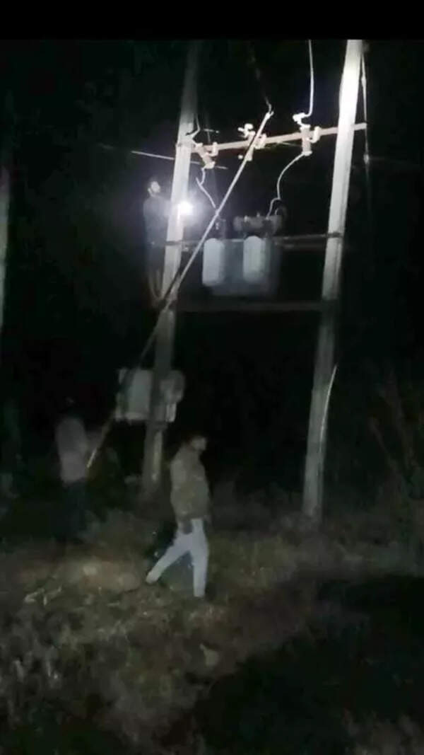 Man climbs distribution point to restore electricty