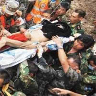 China landslides toll doubles to 700, over 1,000 still missing