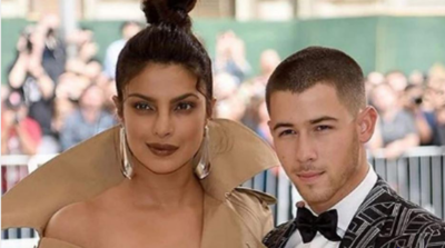 Priyanka Chopra and Nick Jonas avoid paparazzi as they arrive together in Mumbai