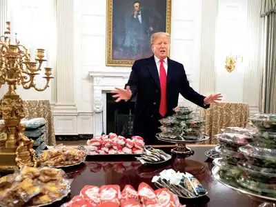 After shutdown closes WH kitchen, Trump orders fries, burgers for football champs
