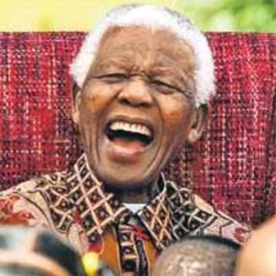 Mandela turns 90, urges people to remember poor