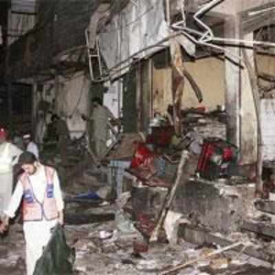 Blasts at crowded Peshawar market  leave over 35 dead
