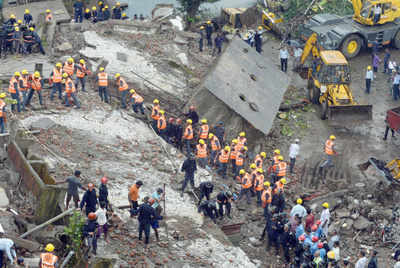 Four dead in Mumbai building collapse, many feared trapped