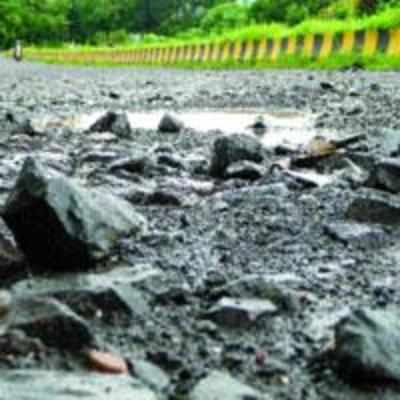 Rains slow down road repairs