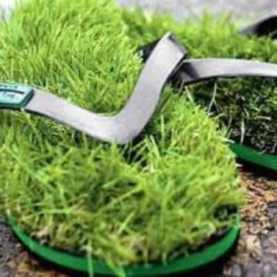 Flip flops with fake grass for that barefoot feeling